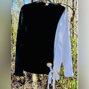 VENUS-Black & White tie front gold grommet blouse.